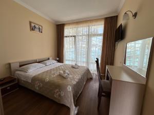 Rúm í herbergi á Hotel Medusa