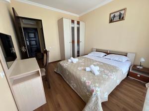 Rúm í herbergi á Hotel Medusa