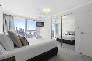 Katil atau katil-katil dalam bilik di Beach Haven, 28th Floor Ocean Views