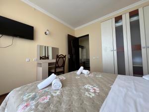 Rúm í herbergi á Hotel Medusa