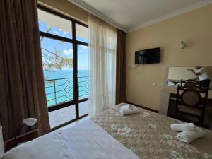 Rúm í herbergi á Hotel Medusa