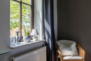 Postel nebo postele na pokoji v ubytování Ferienwohnung "Ostseewind"