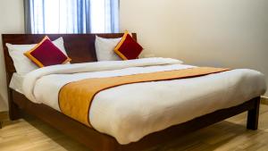 Postel nebo postele na pokoji v ubytování Hotel Sun Suites - A unit of SUN Group - Spacious Rooms - Brand New Building