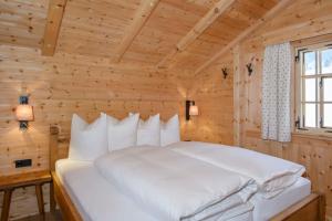 Posteľ alebo postele v izbe v ubytovaní Chalet Berghaus Gauertal