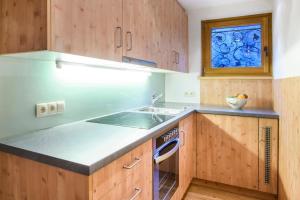Kuchyň nebo kuchyňský kout v ubytování Chalet Waldhaus Rappakopf