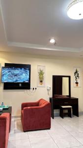 TV a/nebo společenská místnost v ubytování Al Majaridah Hotel