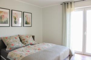 Postel nebo postele na pokoji v ubytování Appartement Schwalbennest