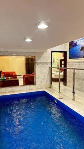 Bazén v ubytování Al Majaridah Hotel nebo v jeho okolí