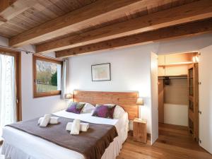 Posteľ alebo postele v izbe v ubytovaní Superbe chalet 4 étoiles avec sauna et garage proche des pistes - FR-1-343-184