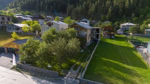 an aerial view of a small village with houses at Skyline Mestia in Mestia