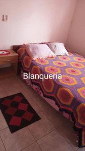 En eller flere senge i et værelse på Marcelo Buja