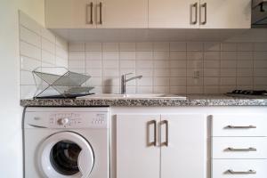 Köök või kööginurk majutusasutuses Palmeraie vintage apartment with pool