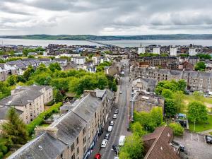 an aerial view of a city with buildings and cars at King Bed - Sleeps 2 - Wi-Fi - Good Amenities Around Area - Smart TV's in All Rooms - Secure Entry - Get in touch Central Short Lets Dundee in Dundee
