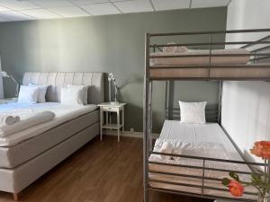 Postel nebo postele na pokoji v ubytování Möre Hotell & Konferens