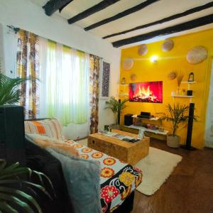 TV a/nebo společenská místnost v ubytování Palm Sunset