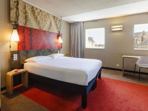 Postel nebo postele na pokoji v ubytování Hotel ibis Rennes Centre Gare Sud