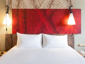 Postel nebo postele na pokoji v ubytování Hotel ibis Rennes Centre Gare Sud