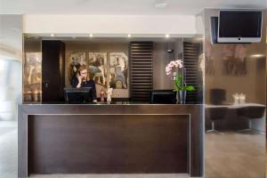 Hostia v ubytovaní Hotel NH Poznan