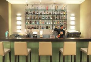 Nápoje v ubytovaní Hotel NH Poznan