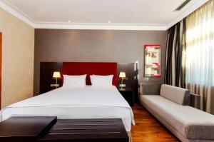Posteľ alebo postele v izbe v ubytovaní Hotel NH Poznan