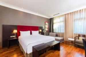 Posteľ alebo postele v izbe v ubytovaní Hotel NH Poznan
