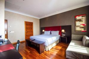 Posteľ alebo postele v izbe v ubytovaní Hotel NH Poznan + 28 fotografií