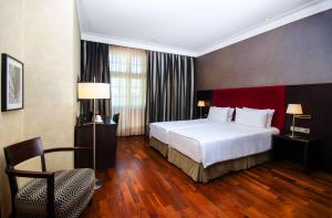 Posteľ alebo postele v izbe v ubytovaní Hotel NH Poznan