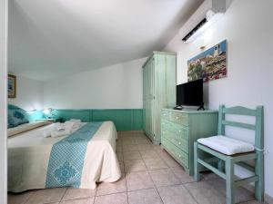 A television and/or entertainment centre at Residenza Garibaldi