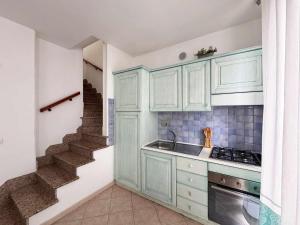 A kitchen or kitchenette at Residenza Garibaldi