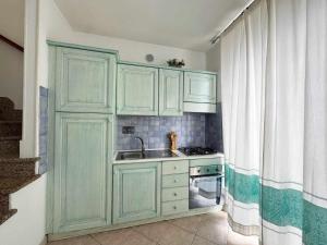 A kitchen or kitchenette at Residenza Garibaldi