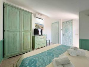 A bed or beds in a room at Residenza Garibaldi