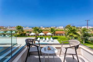 A balcony or terrace at Villa Mariba Blue by Villa Plus
