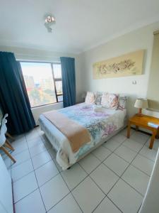 Katil atau katil-katil dalam bilik di 66 The Shades Umhlanga