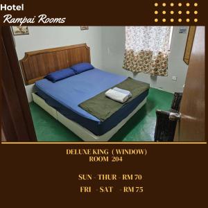 Postel nebo postele na pokoji v ubytování HOTEL Rampai Rooms
