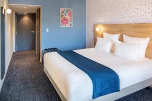 Postel nebo postele na pokoji v ubytování Best Western Hotel Fontaine Argent