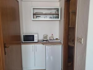 Kuchnia lub aneks kuchenny w obiekcie Rooms Raos