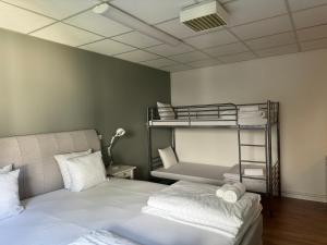 Postel nebo postele na pokoji v ubytování Möre Hotell & Konferens
