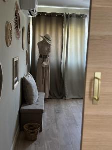Posezení v ubytování Chez Flo la suite