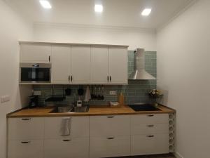 Η κουζίνα ή μικρή κουζίνα στο Apartamento El Topo +6 φωτογραφίες