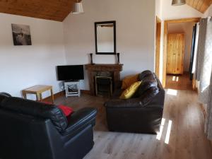 Predel za sedenje v nastanitvi Sunriseview Cottages