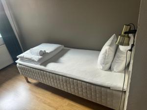 Postel nebo postele na pokoji v ubytování Möre Hotell & Konferens