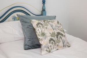 Ένα ή περισσότερα κρεβάτια σε δωμάτιο στο VIA DE LA PLATA SUITES 1a