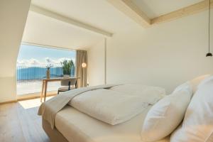 Ένα ή περισσότερα κρεβάτια σε δωμάτιο στο Hotel am Hang