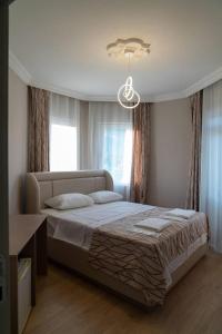 Postel nebo postele na pokoji v ubytování Green Garden Otel
