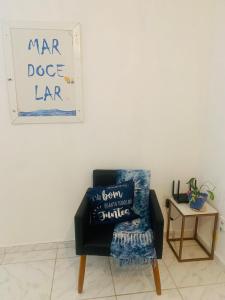 Χώρος καθιστικού στο Ground floor apartment accommodation in Itanhaem