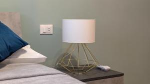 Postel nebo postele na pokoji v ubytování Conca D'Oro Guest House - Anna