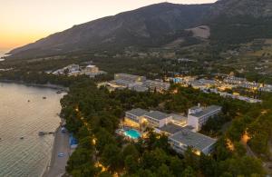 an aerial view of a resort next to the water at Bluesun Hotel Borak in Bol