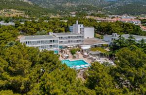 an aerial view of a resort with a swimming pool at Bluesun Hotel Borak in Bol