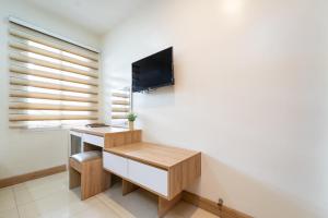 TV a/nebo společenská místnost v ubytování Bella Hotel Bai Sau Vung Tau
