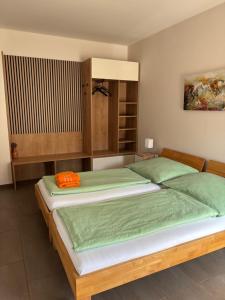 Voodi või voodid majutusasutuse Privatzimmer Jarosch toas